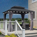 Grey hardtop gazebo with string lights and outdoor furniture on a deck, patio shade solution