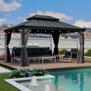 Grey hardtop gazebo with outdoor furniture, lighting, and a pool. Perfect for patio shade solutions.