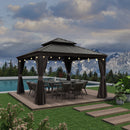 Grey hardtop gazebo with outdoor dining set, string lights, and curtains. Patio shade solution with a pool view.