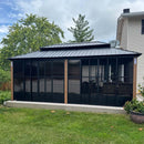 Wood grain sunroom gazebo with black steel frame and screen windows, an outdoor patio shade solution.