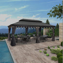 Grey hardtop gazebo with curtains, string lights, and outdoor furniture by a pool; patio shade solution