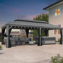 Light grey hardtop gazebo with string lights, outdoor patio furniture and hot tub under a dark sky