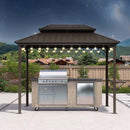 Bronze hardtop grill gazebo with outdoor kitchen, string lights, perfect for patio BBQ and outdoor entertaining.