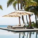 PURPLE LEAF double top cantilever patio umbrella in wood color, offering shade by the pool.