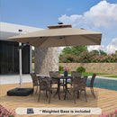 Beige double top cantilever patio umbrella with included weighted base over an outdoor dining set, patio shade solutions