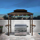 Bronze hardtop grill gazebo with built-in grill, string lights, and side shelves, for outdoor BBQ and entertaining.