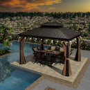 Bronze hardtop gazebo with string lights and outdoor dining set by a pool, patio shade solution.