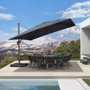 Cantilever patio umbrella over outdoor dining set on a patio with pool and mountain view