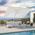 White cantilever patio umbrella with outdoor furniture set by a pool, patio shade solution, outdoor furniture