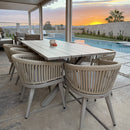 PURPLE LEAF champagne wicker rattan outdoor dining set with aluminum table by pool.