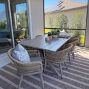 PURPLE LEAF champagne outdoor dining set with aluminum table, woven rattan chairs & cushions.