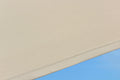 Beige polyester fabric texture with seam for #E Series# cantilever umbrella replacement canopy.