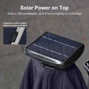 PURPLE LEAF SUNBRELLA cantilever umbrella with solar panel powering outdoor lights.