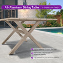 Champagne all-aluminum rectangular patio dining table with slatted top and X-frame legs.