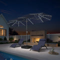 PURPLE LEAF 13'X7' double-sided large patio market navy blue umbrella with light and free base .The LED light strips under the umbrella illuminate the lounge chairs and the swimming pool, creating a warm and cozy atmosphere.