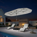 PURPLE LEAF 13'X7' double-sided large patio market white umbrella with light and free base .The LED light strips under the umbrella illuminate the lounge chairs and the swimming pool, creating a warm and cozy atmosphere.
