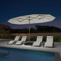 PURPLE LEAF 14'X8' double-sided large patio market white umbrella with light and free base .The LED light strips under the umbrella illuminate the lounge chairs and the swimming pool, creating a warm and cozy atmosphere.