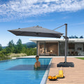 PURPLE LEAF 8x8 ft grey cantilever umbrella providing shade over a poolside deck and swimming pool.