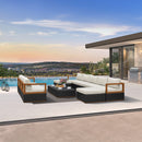 PURPLE LEAF Griffin patio set: black woven base, wood frame, cream cushions, coffee table, ottoman by pool.