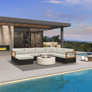 PURPLE LEAF Griffin U-shaped patio set in black with grey cushions and fire pit table by a pool.